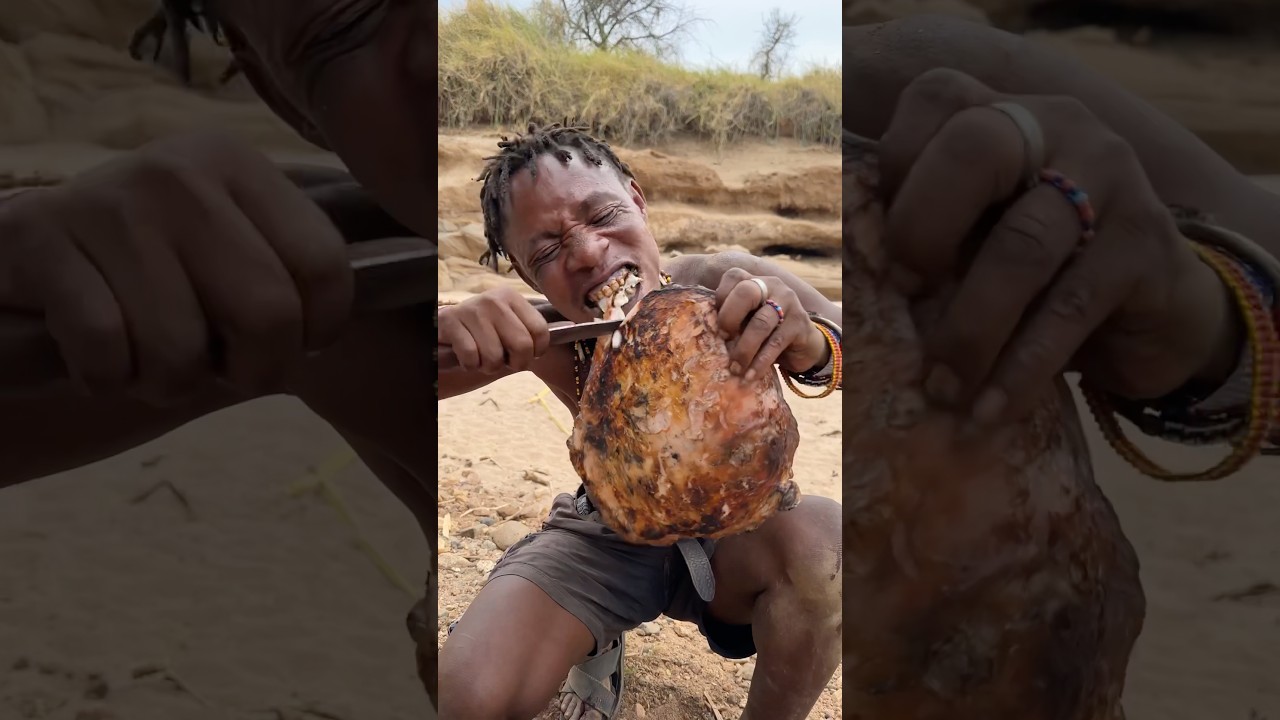 ⁣Fresh from the fire: Hadzabe savor hot meat in the wild"